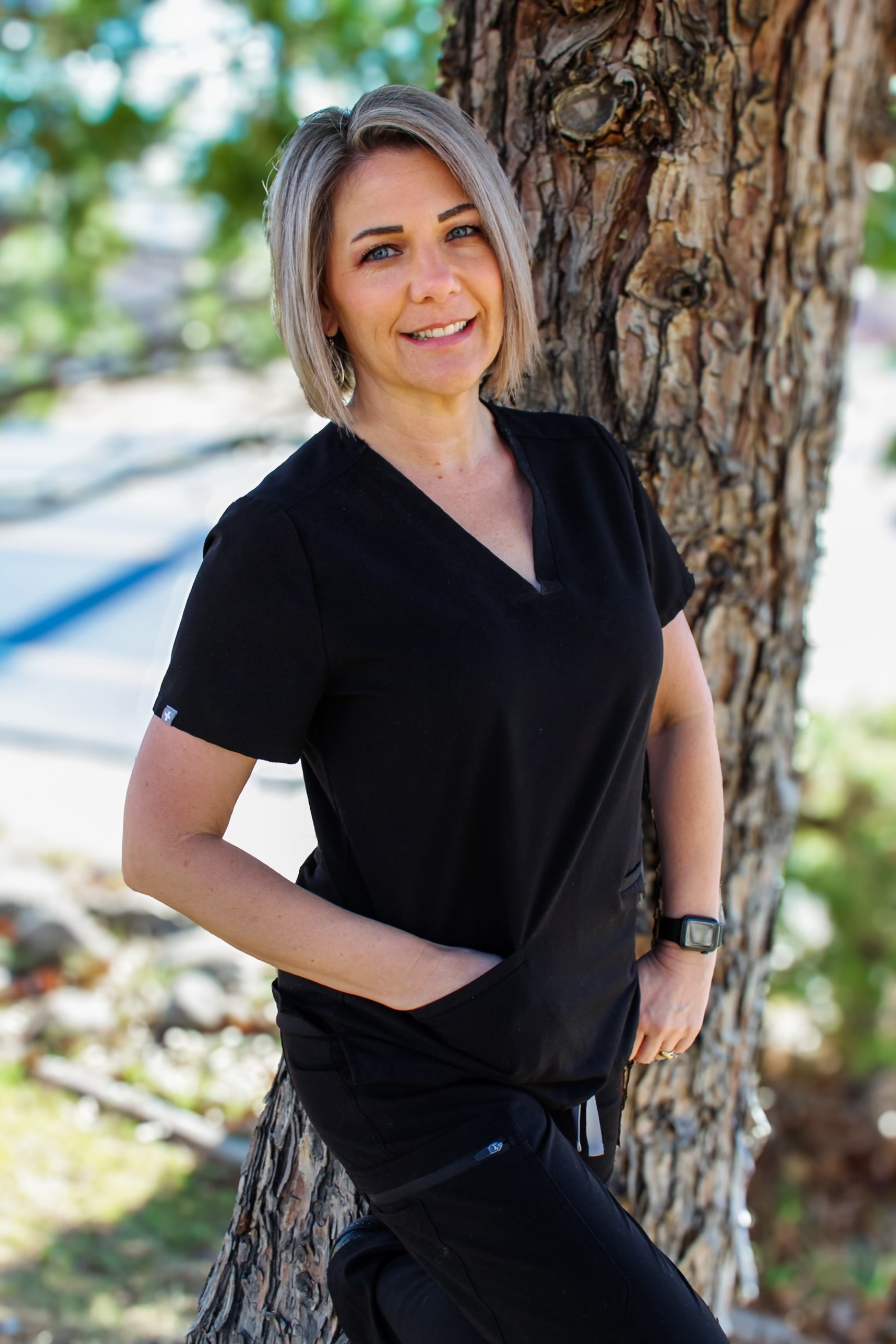 Aleta the front office manager is smiling for her headshot in Sparks, Nevada at Andrews Braces
