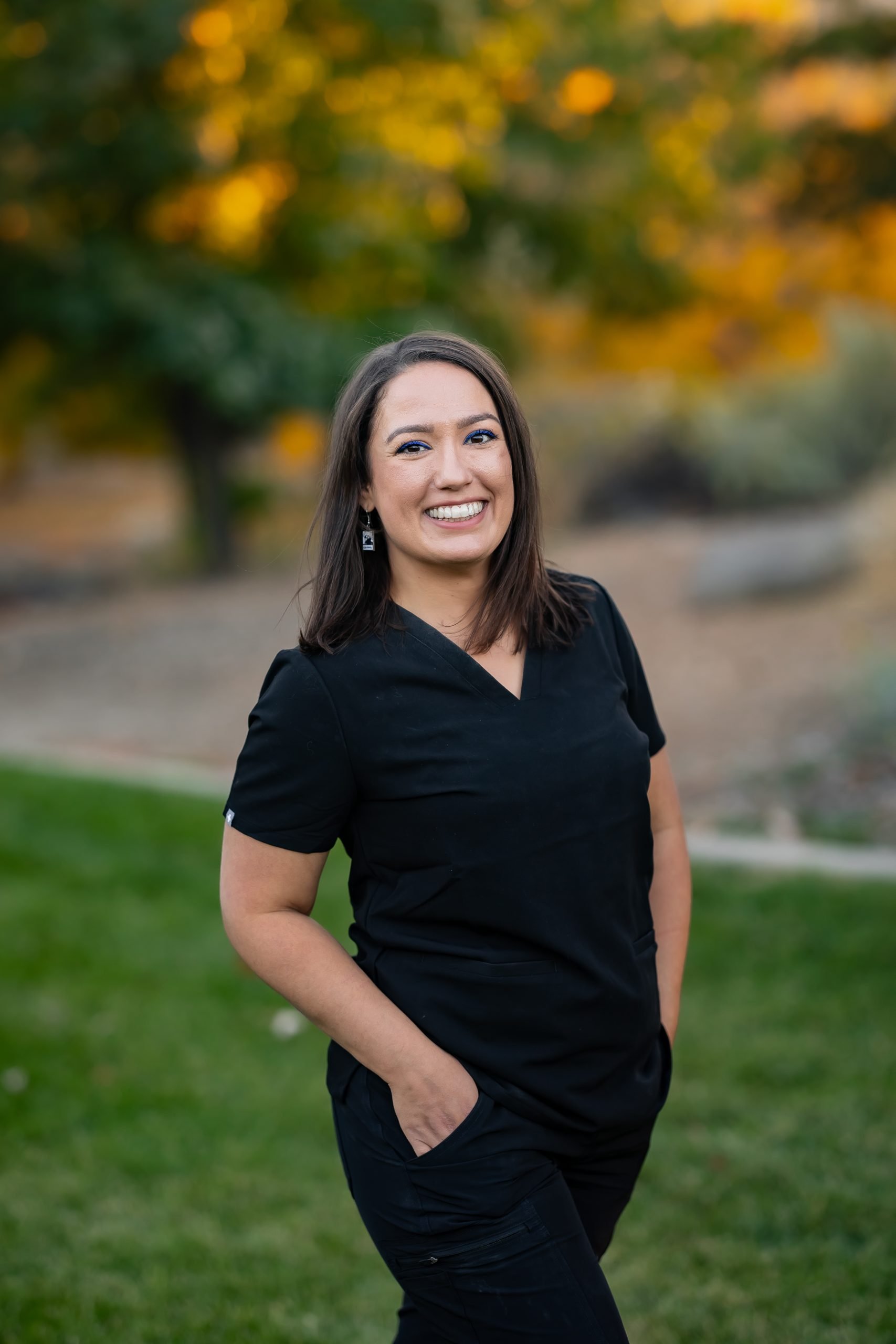 Megan is smiling for her headshot in Sparks, Nevada
